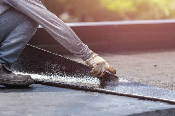 Professional Basement Waterproofing technician working in Claremont, NH